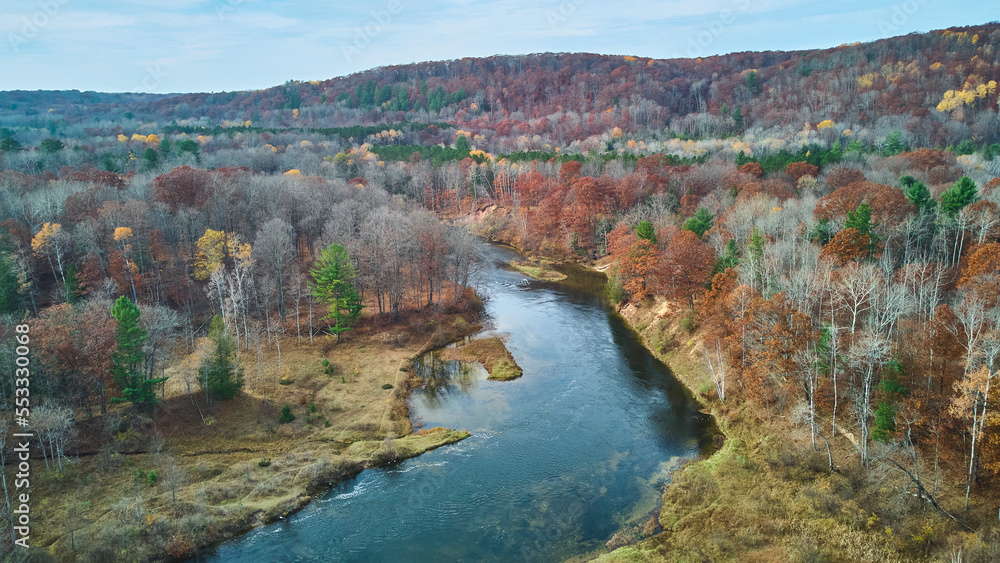 Aerial view over river in late fall of Michigan