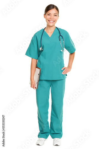 Nurse or young doctor standing smiling isolated cutout PNG on transparent background. Woman medical professional in green scrubs smiling. Mixed race ethnic Chinese Asian and Caucasian female model.