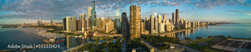 Wide panorama of Chicago city skyline from aerial view at Navy Pier during sunrise