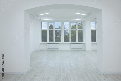 New empty room with clean windows and white walls