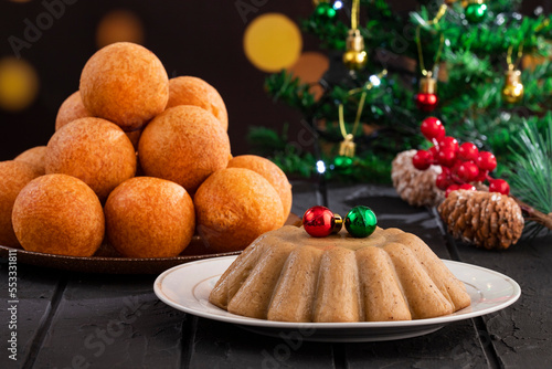 Traditional Colombian christmas food - Buñuelos y natilla photo
