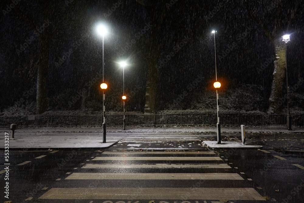 London in snow at night in December London in snow at night in December