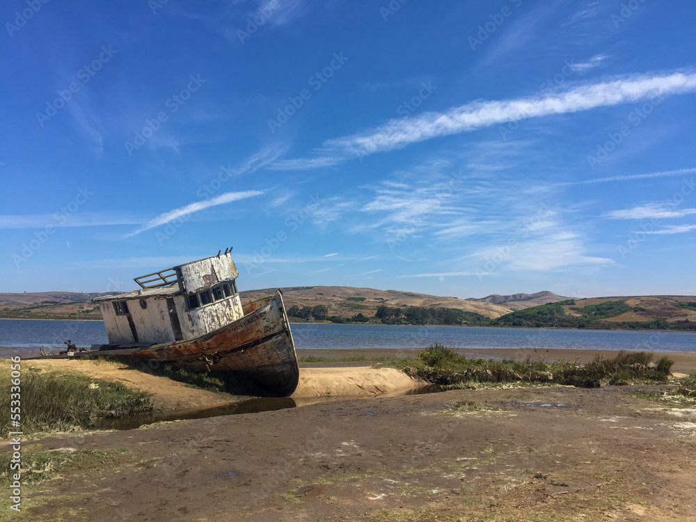 old fishing boat abandoned along the shore located just north of San Francisco in Reyes Park