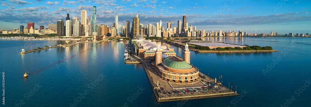 Fototapeta premium Stunning panorama of entire Navy Pier on Lake Michigan in Chicago with skyline during morning light