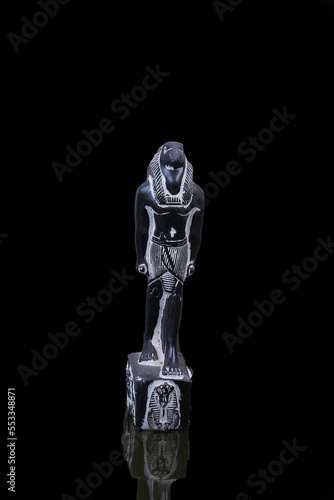 statue made of basalt stone, glass and metal dating back to the Pharaonic era © Yasser