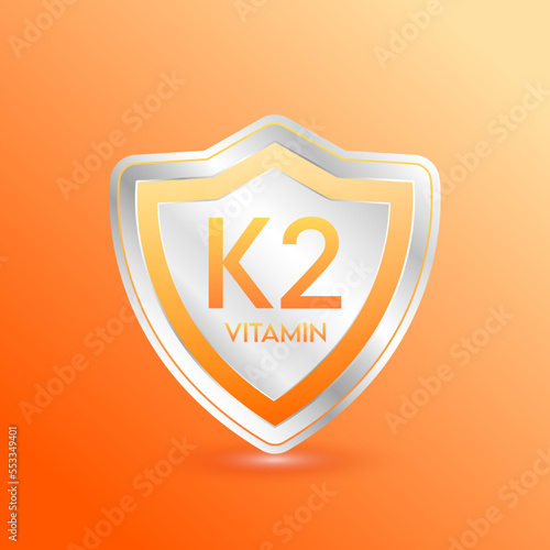 Vitamin K2 shield orange. Protect the body stay healthy. For nutrition products food. Metal aluminum label 3d isolated realistic on solid background. Medical scientific concepts. Vector illustration.