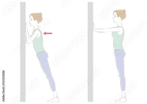 壁腕立て伏せをする女性