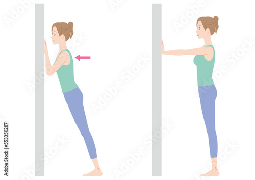 壁腕立て伏せをする女性