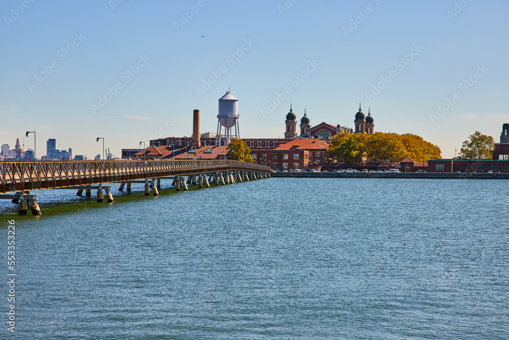 View of Ellis Island from New Jersey coast with bridge leading to island
