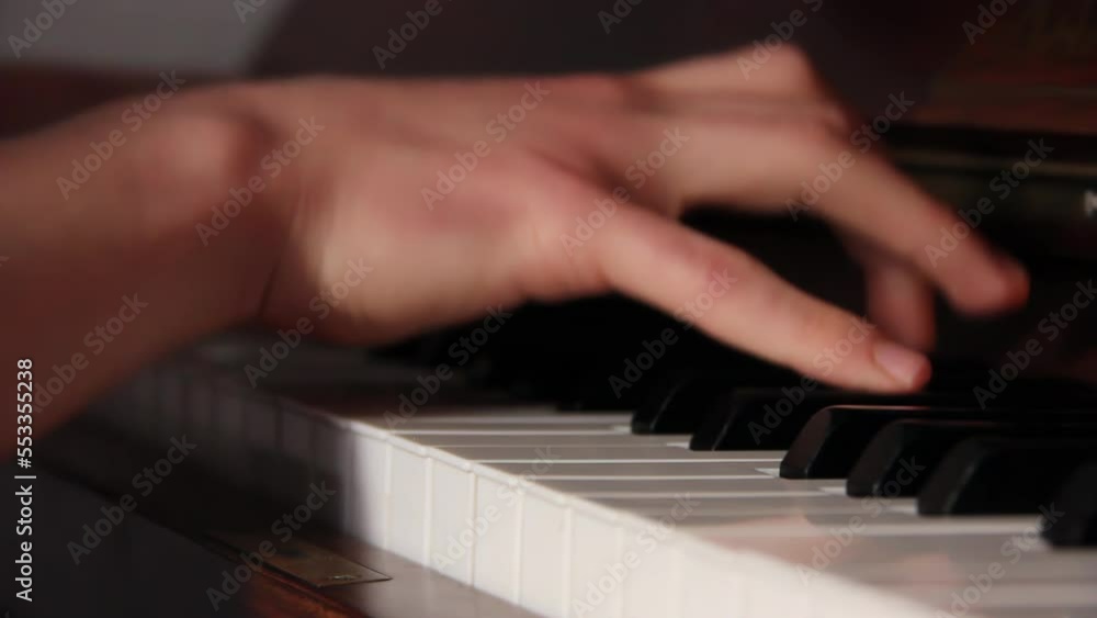 A Man Playing Piano. Close Up. 4K Resolution. A Man Playing Piano. Close Up. 4K Resolution.