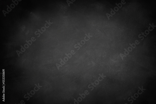 Chalkboard or blackboard texture abstract background with grunge dirt white chalk rubbed out on blank black billboard wall  copy space  element for wallpaper