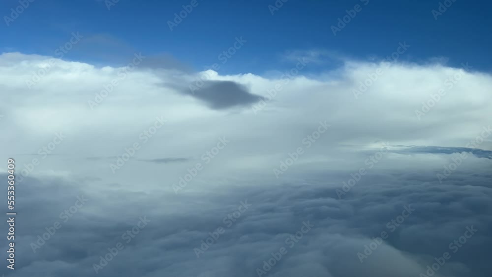 Winter snow clouds recorded from a jet cockpit during descent in a cold moorning. 4k Winter snow clouds recorded from a jet cockpit during descent in a cold moorning. 4k