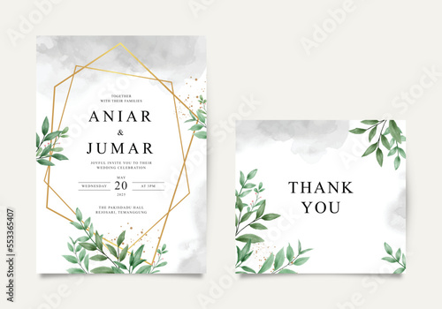 Elegant wedding invitation card with geometric frame and green leaves