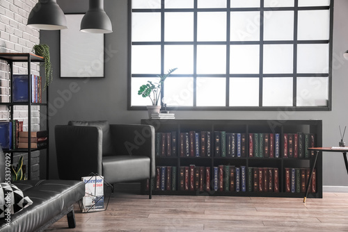 Bookshelves, armchair and s...