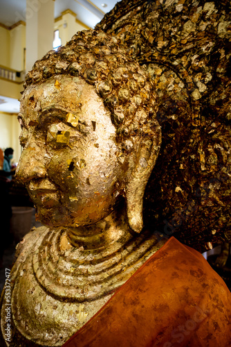 Buddha statues Phra Phutthasothon or Luang Pho Sothon, at Wat Sothonwararam Worawihan temple originally known as Wat Hong, by the Bang Pakong River. Chachoengsao Province, Thailand photo