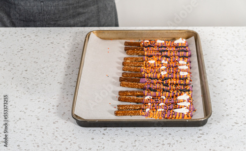 Halloween chocolate-covered pretzel rods