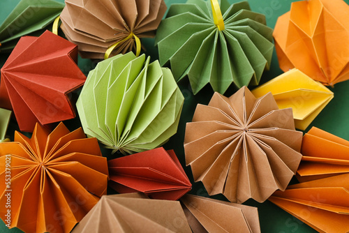 Paper Christmas balls on gr...