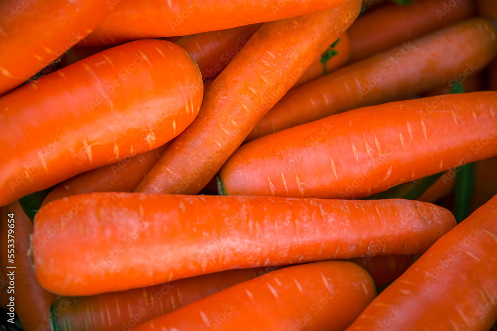 close up of fresh orange carrot in the market. healthy food for diet. close up of fresh orange carrot in the market. healthy food for diet.