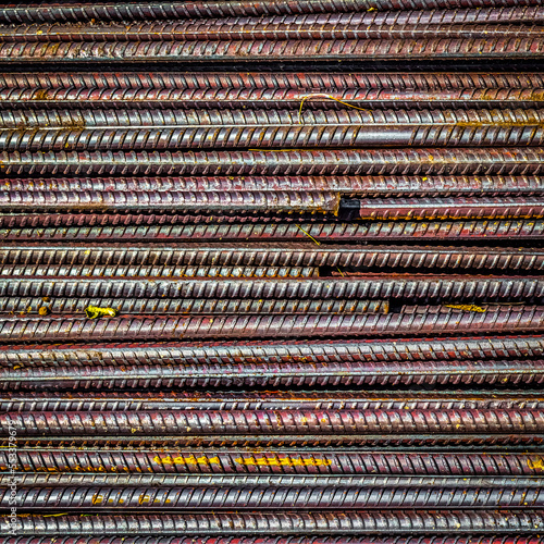 Pile of construction metal reinforcement at a construction site close-up.