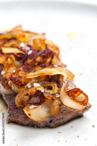 steak covered by caramelized onion