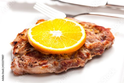 pork cutlet served with orange