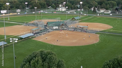 Multiple Softball Games At Andrews Park Champlin Minnesota - Orbiting Drone Shot