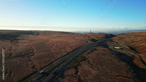 Aerial View of the M62 motorway as it travels across the highest part of the moors. Saddleworth Moor, Heath, heather, moors. photo