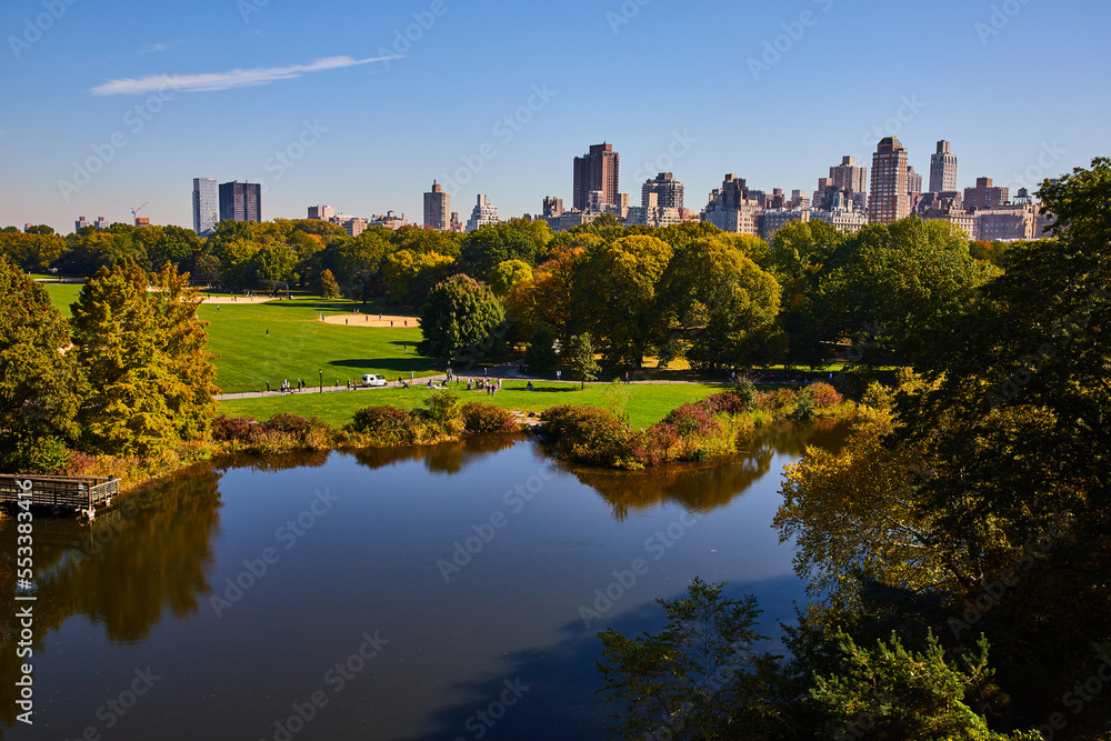 Pond in Central Park with city in background New York City