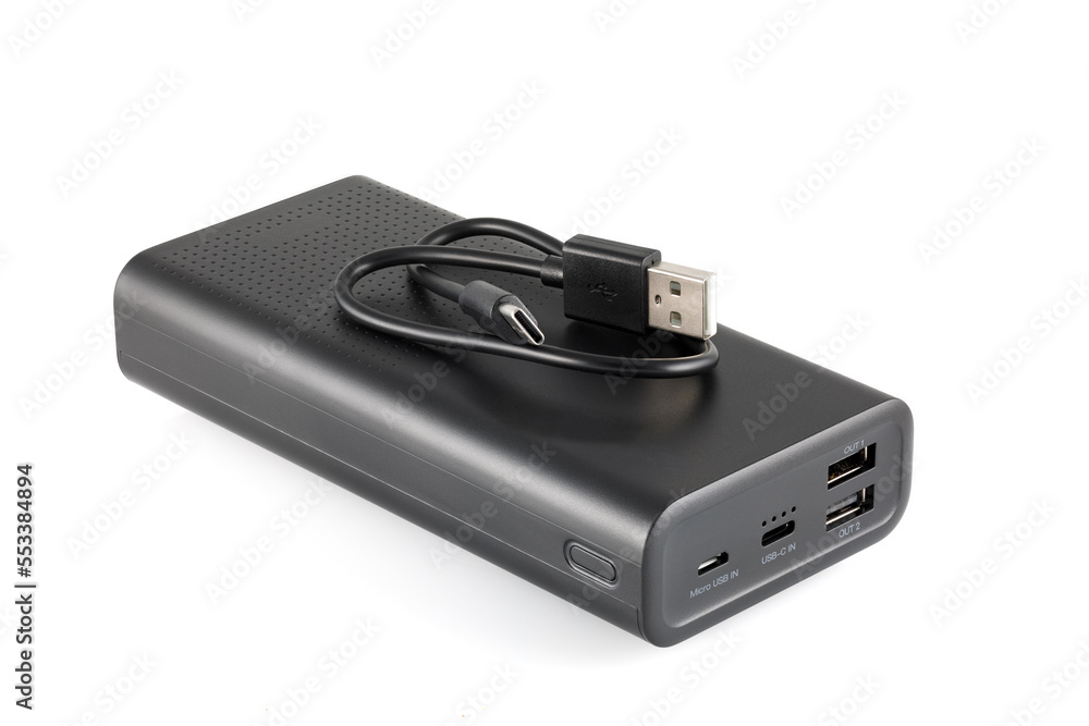 Additional self-contained external battery for charging mobile and other device. Power bank isolated on white background. Stylish charger (rechargeable battery). Full depth of field.
