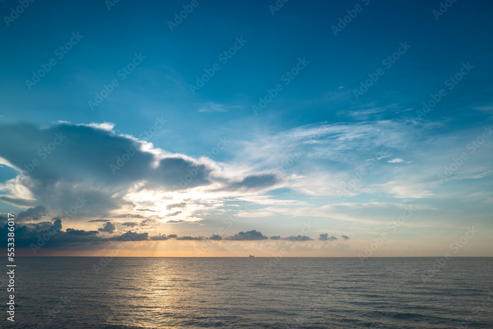 Sunset at the sea. Sunset at beach. Sunrise sea on tropical beach. Landscape of beautiful beach. Beautiful sunset at sea. Ocean sunset on sky background with colorful clouds.