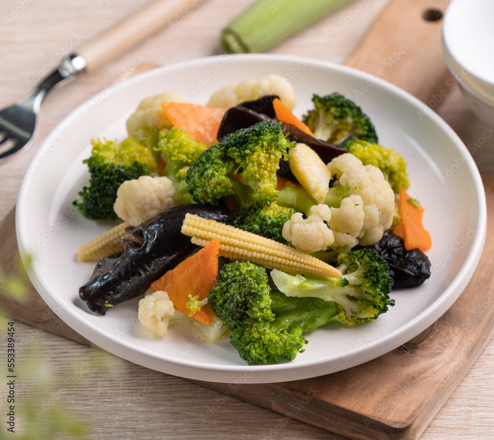 Homemade fresh boiled vegetables with cauliflower, broccoli, black fungus and baby corn. Homemade fresh boiled vegetables with cauliflower, broccoli, black fungus and baby corn.