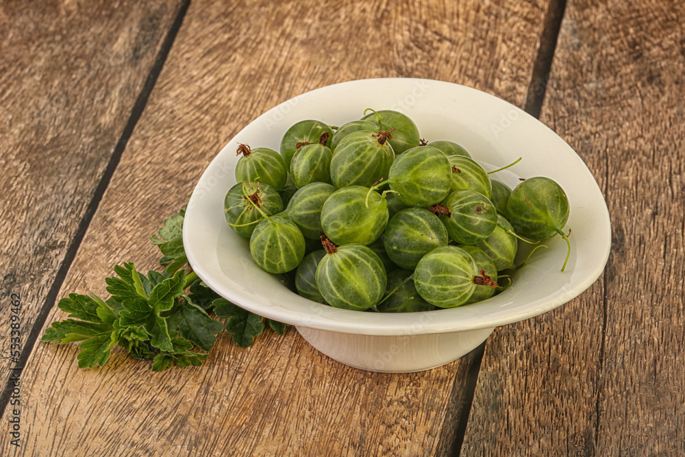 Natural ripe gooseberry heap in the bowl Natural ripe gooseberry heap in the bowl