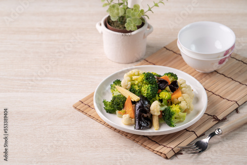 Homemade fresh boiled vegetables with cauliflower, broccoli, black fungus and baby corn.