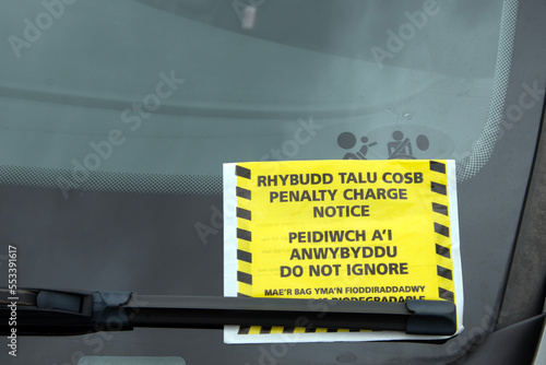 Welsh parking ticket on windscreen of car photo