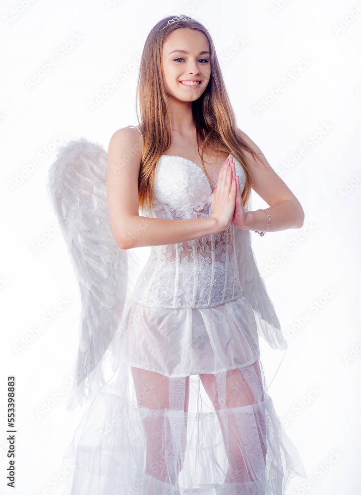 Cupid cute angel - Concept of Valentines Day. Angelic face. Fashion Glamour Halloween art design. Concept of innocent girl. Cute little female cupid. Enjoying magic moment. Cupid cute angel - Concept of Valentines Day. Angelic face. Fashion Glamour Halloween art design. Concept of innocent girl. Cute little female cupid. Enjoying magic moment.