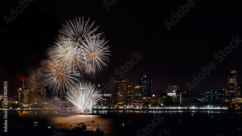 Abstract colored firework background light up the sky with dazzling display © meen_na