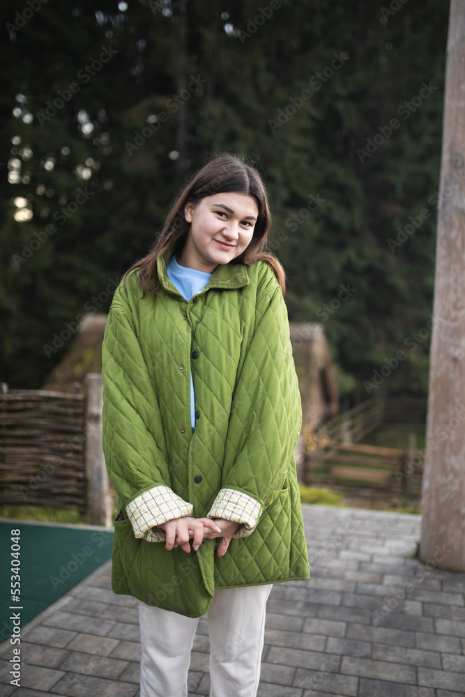 The girl rests in the mountains and enjoys life. A happy and smiling girl spends her weekend in the mountains. Rest and travel. The girl rests in the mountains and enjoys life. A happy and smiling girl spends her weekend in the mountains. Rest and travel.