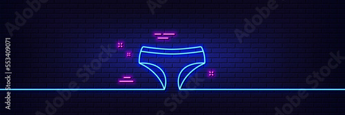 Neon light glow effect. Panties line icon. Underwear pants sign. Women undies lingerie symbol. 3d line neon glow icon. Brick wall banner. Panties outline. Vector
