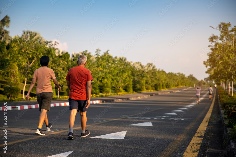 Senior people  walking exercise at public park healthy  lifestyle  concept