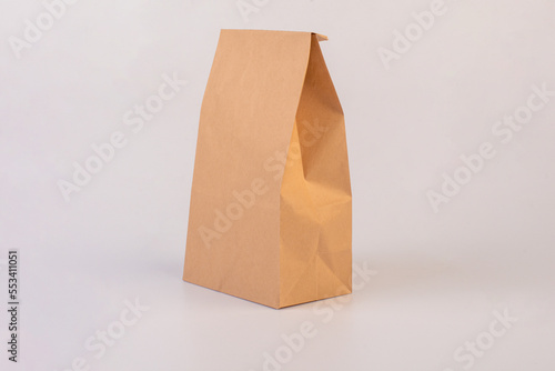 Close up brown paper bags on white background.