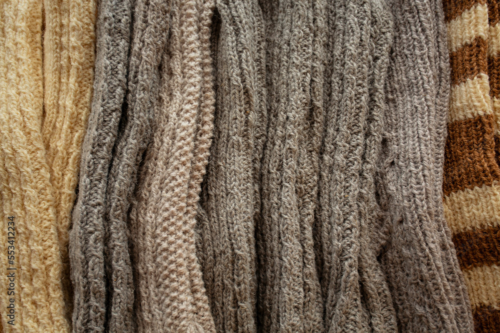 knitted hand made gloves and socks made of woolen thread knitted hand made gloves and socks made of woolen thread