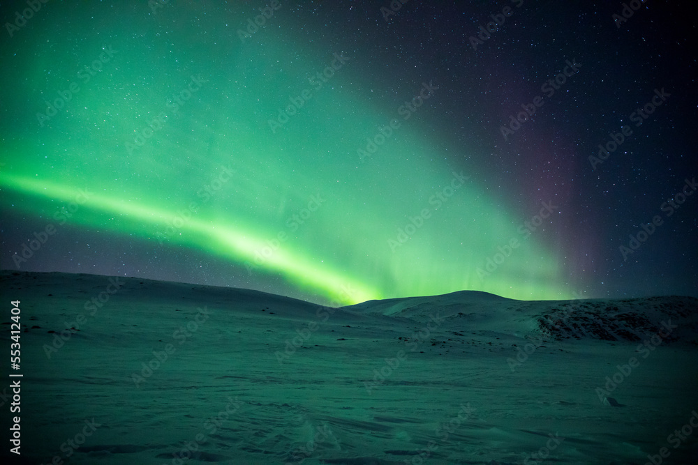 Northern lights in Reinheim Cabin, Dovrefjell National Park, Norway