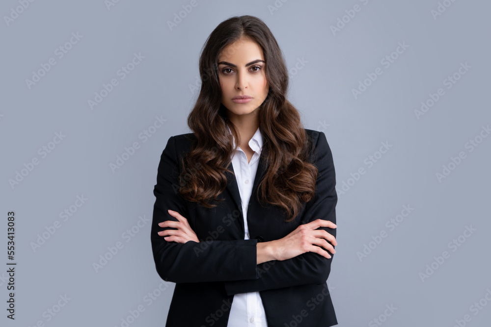 Portrait of successful business woman in suit on gray isolated background. Serious office female worker, manager employees. Portrait of successful business woman in suit on gray isolated background. Serious office female worker, manager employees.