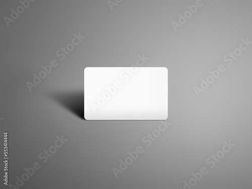 A front view of a blank mockup gift card on a studio gray isolated background. Readymade showcase 3D render image for mockup. Invite, identity, stationery, advertising, empty mockup for presentation.