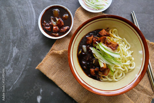 Jajangmyeon or JJajangmyeon is Korean Noodle with Black Sauce - served on table
