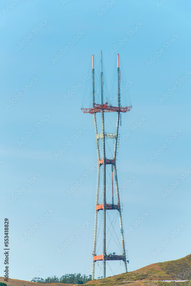 Red and white Sutro tower with natural dirt foreground Red and white Sutro tower with natural dirt foreground