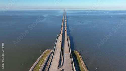 Longest bridge in world over continuous water. Traffic on highway in Metairie Louisiana and Lake Pontchartrain Causeway. Aerial view. Engineering feat. photo