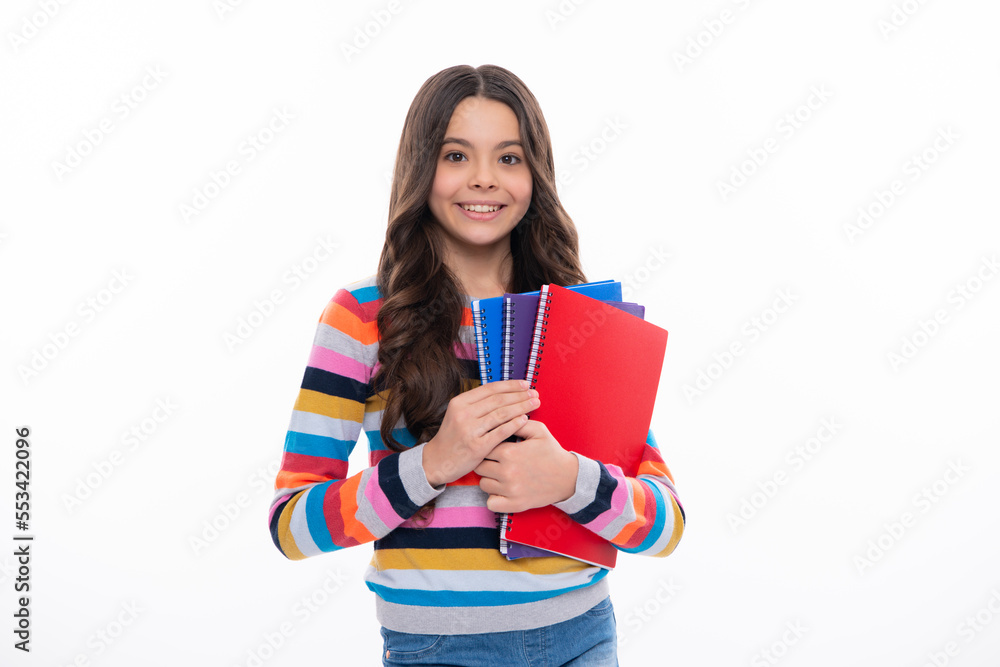Teenager school girl with books isolated studio background. Happy girl face, positive and smiling emotions. Teenager school girl with books isolated studio background. Happy girl face, positive and smiling emotions.