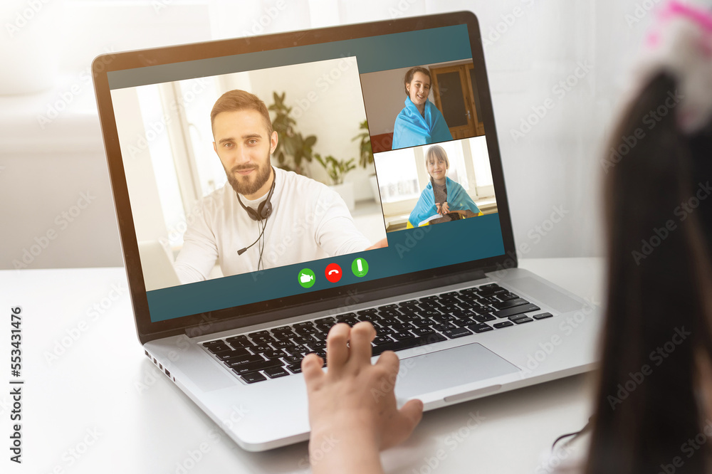 a girl having video chat with the teacher and playing music a girl having video chat with the teacher and playing music