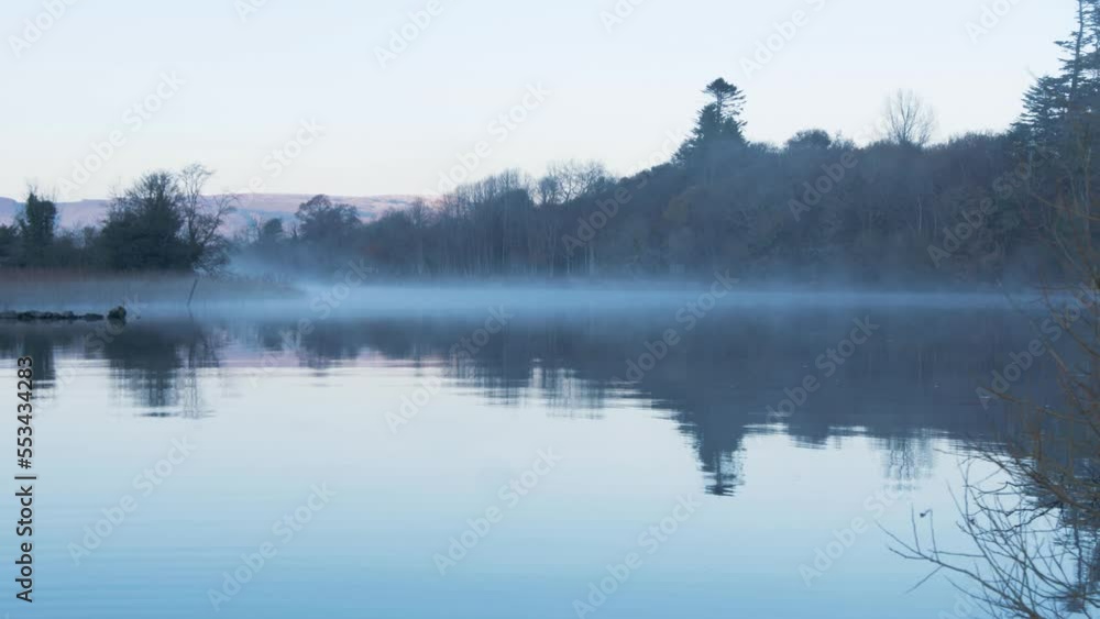 The spectacular scene of fog on the river in winter The spectacular scene of fog on the river in winter
